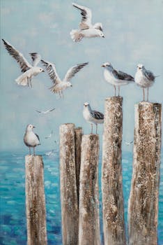 Tableau bord de mer avec mouettes sur l'eau