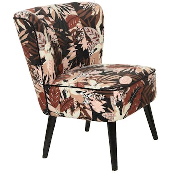 Fauteuil en tissu décor feuilles tropicales