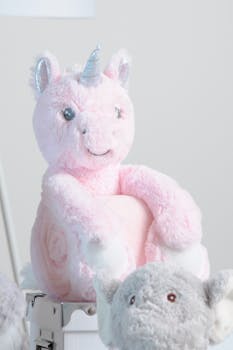 Licorne rose avec plaid