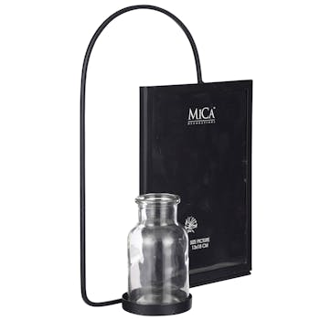 Cadre photo noir avec vase