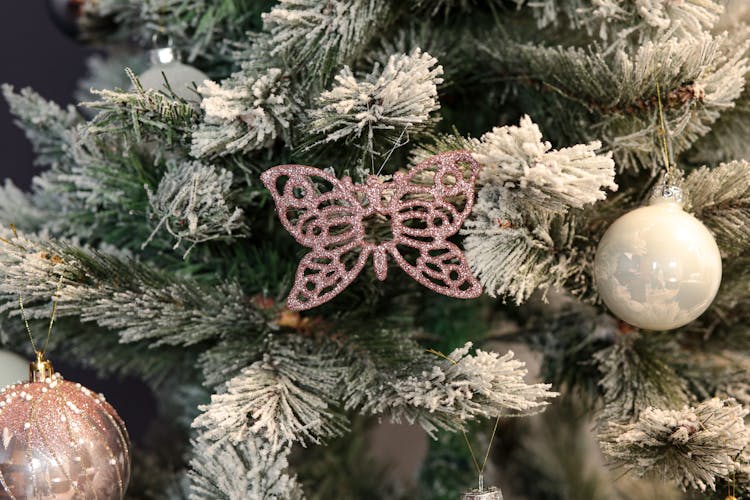 Boite de 20 décors de Noël papillon rose poudré
