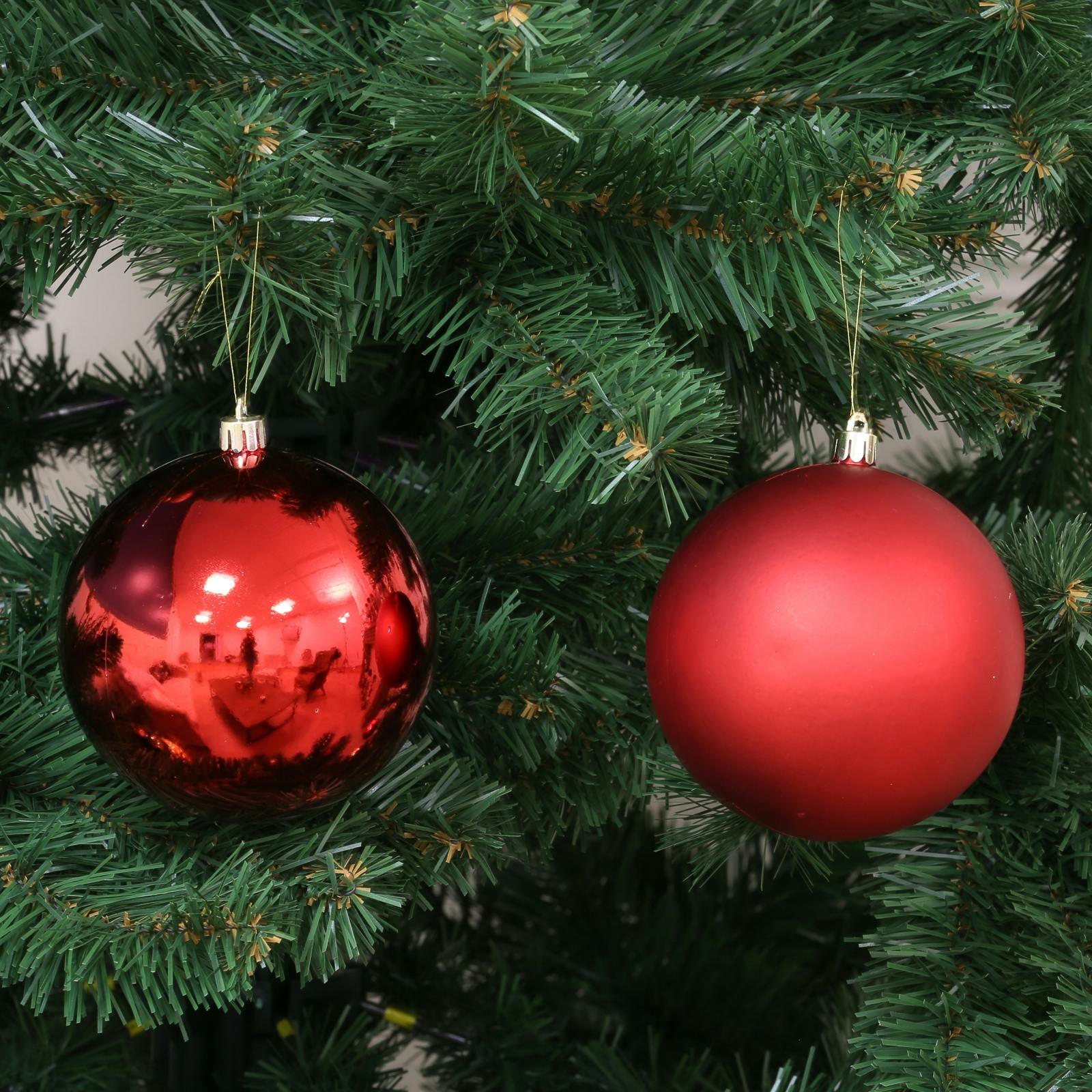Boite de 4 boules de Noël rouges assorties