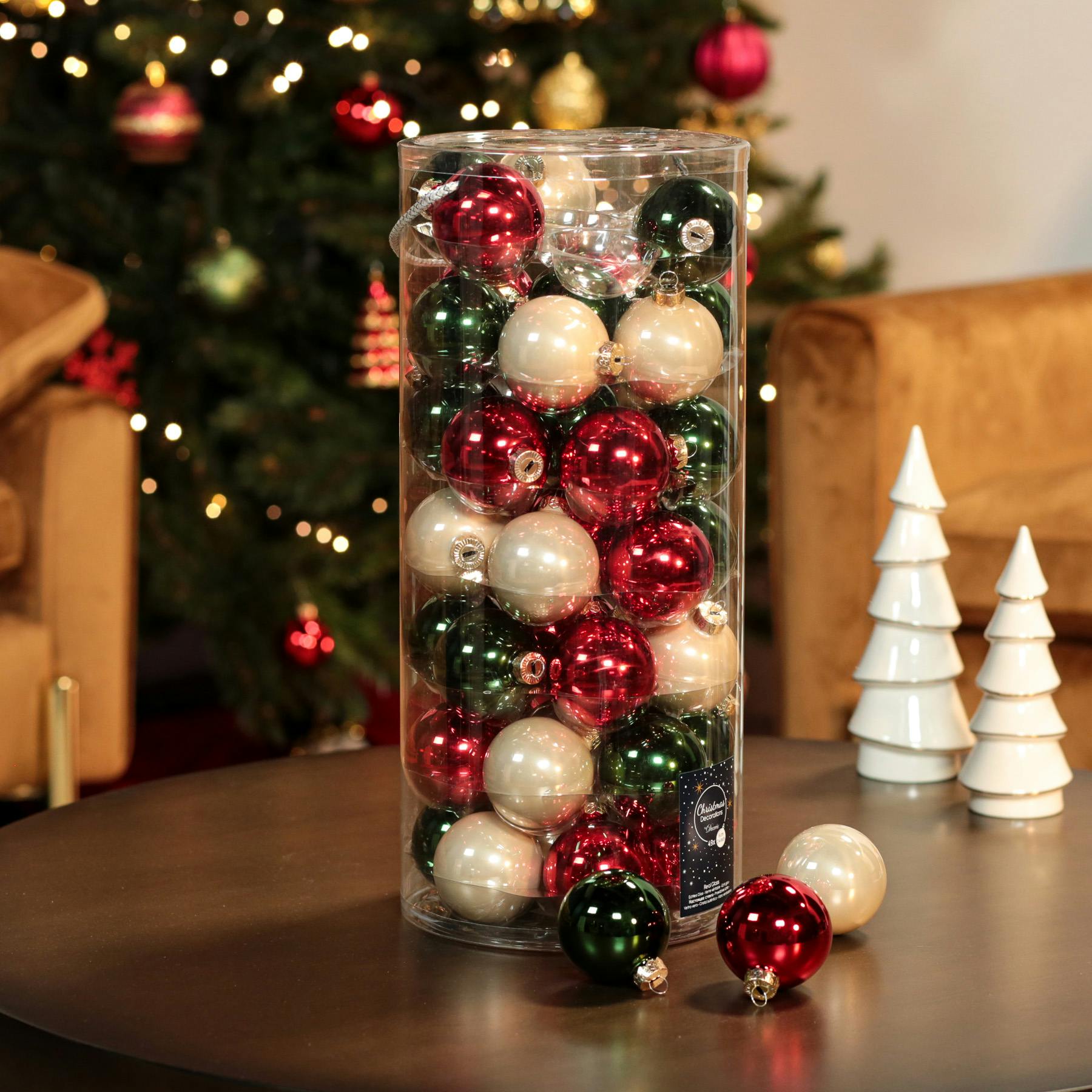 Boite de 49 boules de Noël tons verts et rouges
