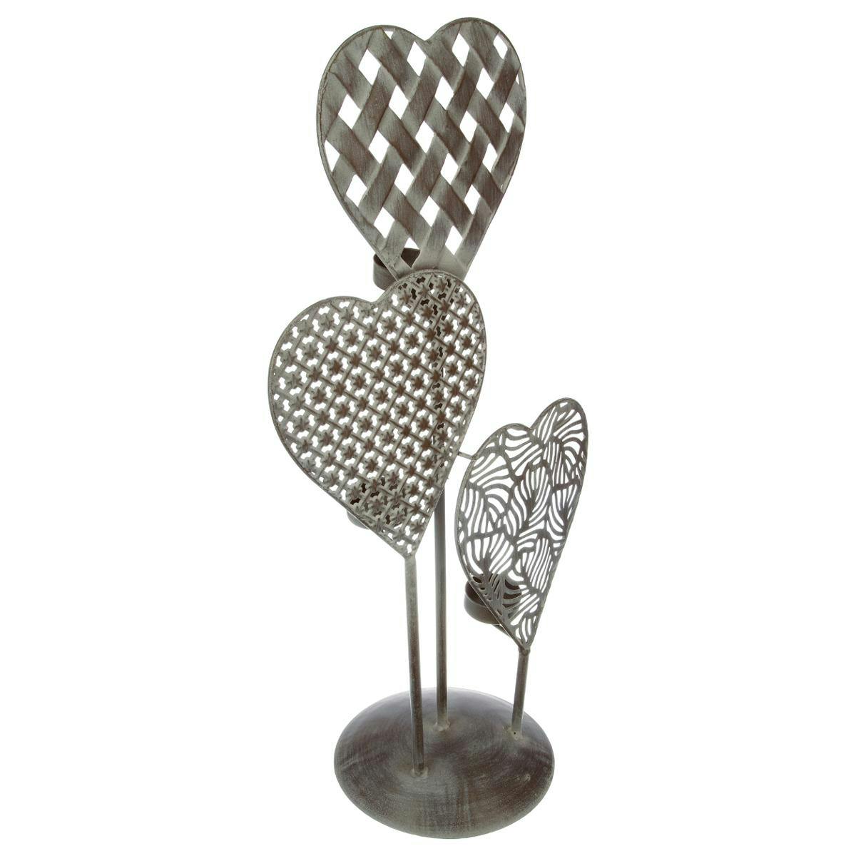 Bougeoir sur pied 3 coeurs décor découpé en métal grisé avec 3 porte chauffe-plats 29x56x17cm