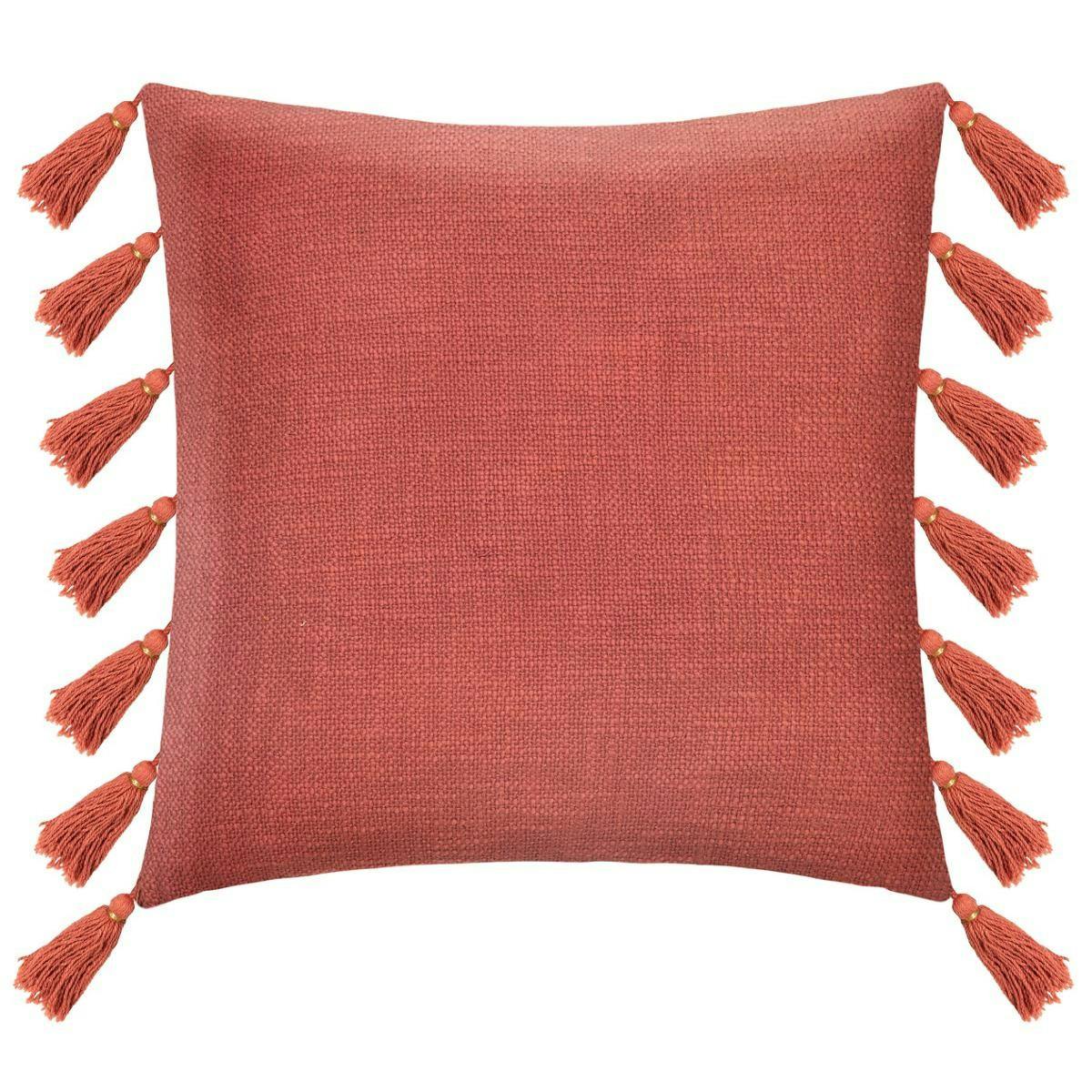 Coussin couleur terracotta à pompons