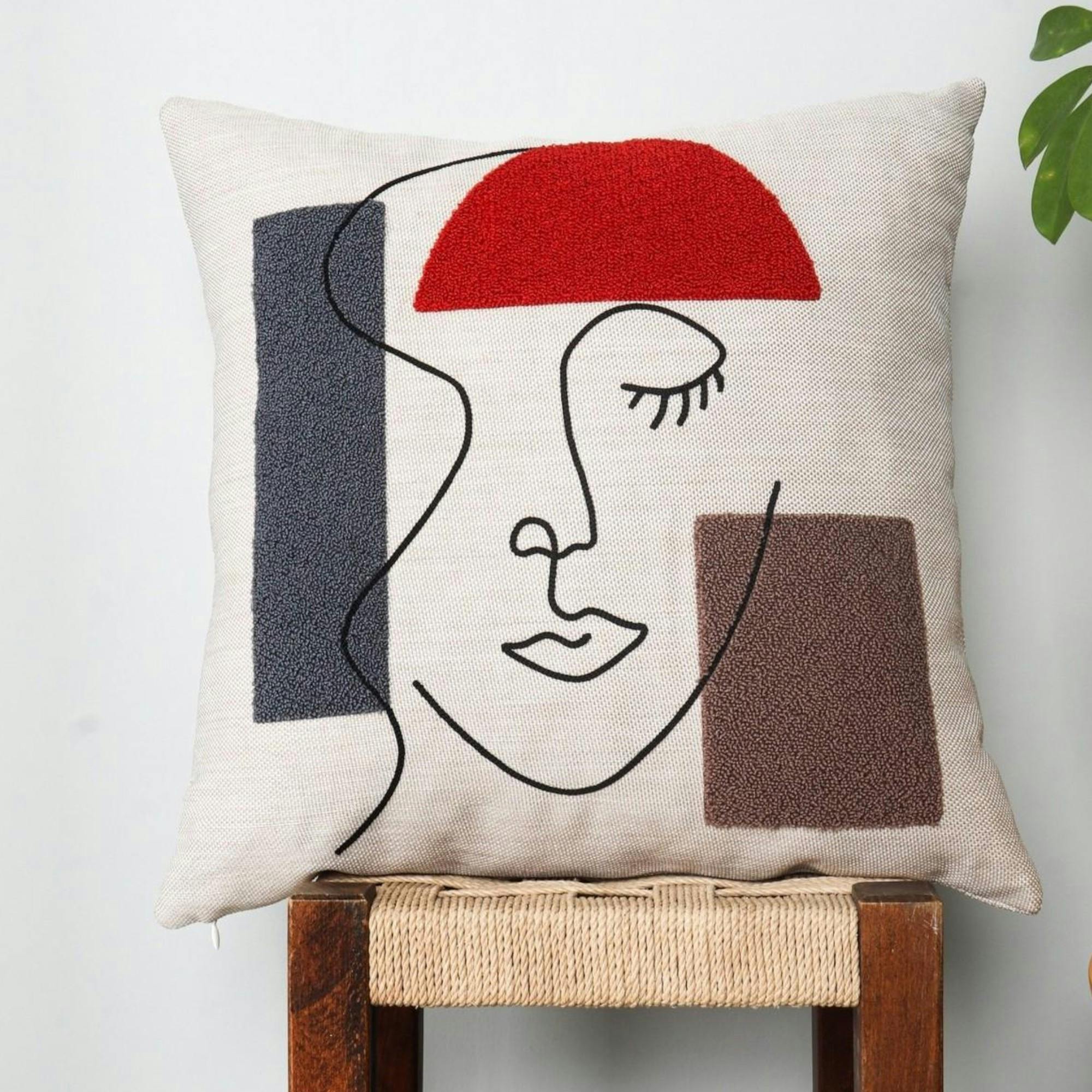 Coussin de canapé en lin – visage arty brodé IZMIR