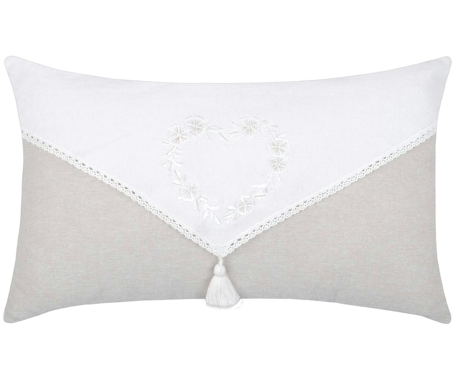Coussin déco cœur bicolore écru / blanc à pompon