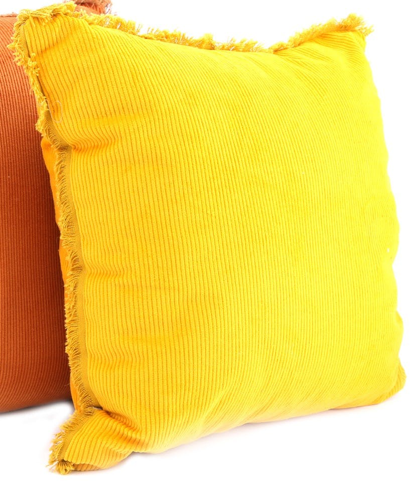 Coussin jaune à franges