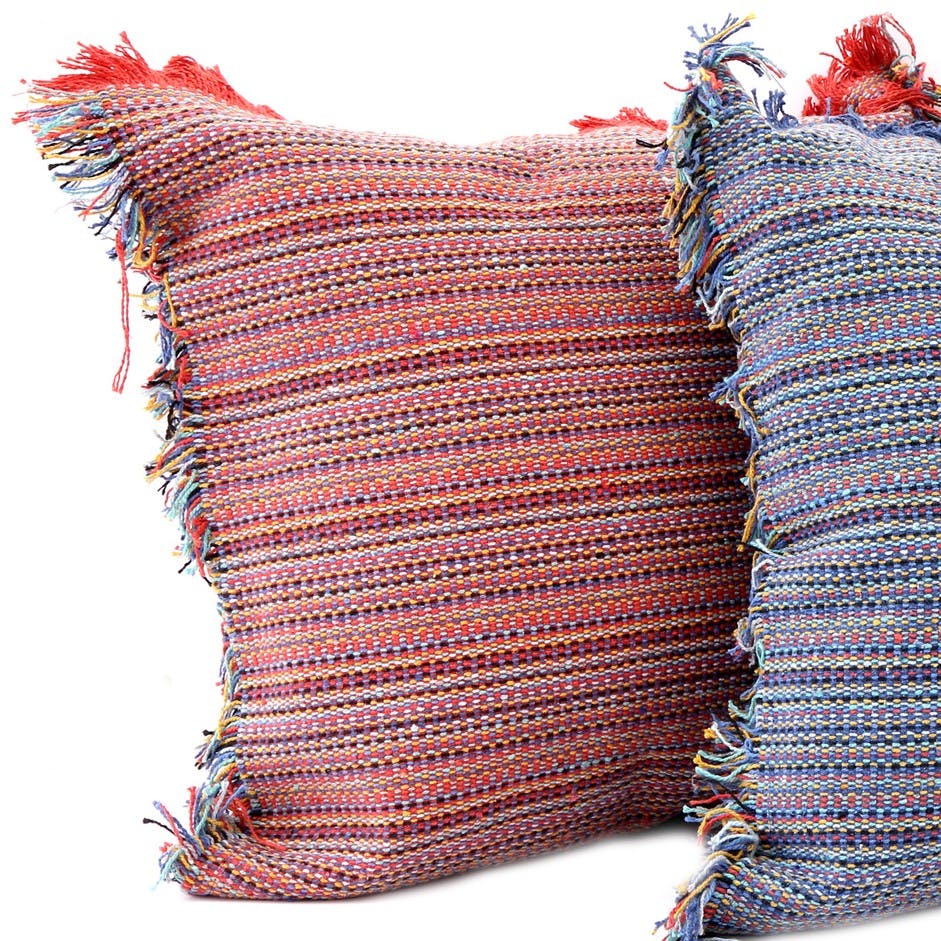 Coussin tissé tons rouges