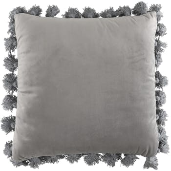 Coussin uni bleu clair à pompons