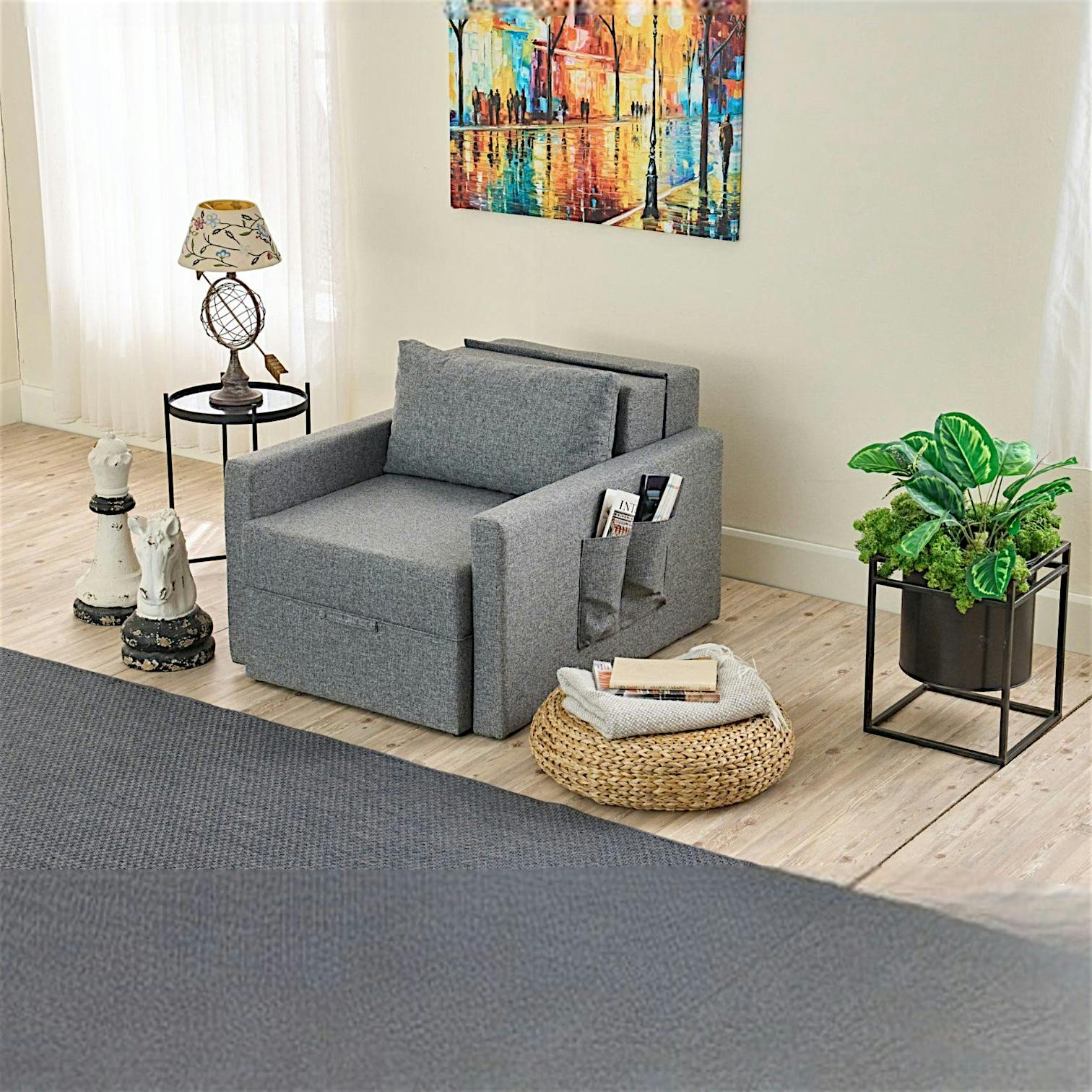 Fauteuil lit convertible gris avec porte-revues MANIL