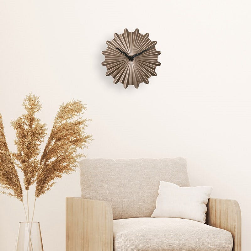 Horloge murale motif soleil