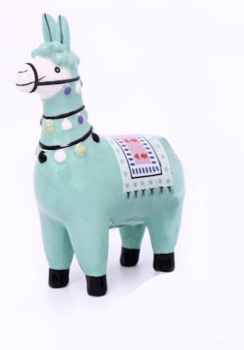 Lama déco H15cm en céramique bleue turquoise et décor multicolor