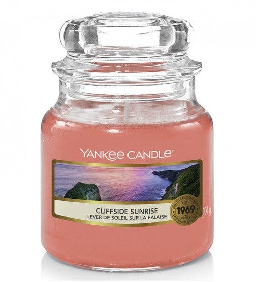 Lever de soleil sur la falaise bougie parfumée petite jarre YANKEE CANDLE