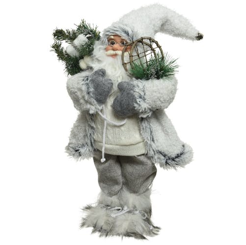 Père Noël figurine en habits blancs et raquettes 30 cm
