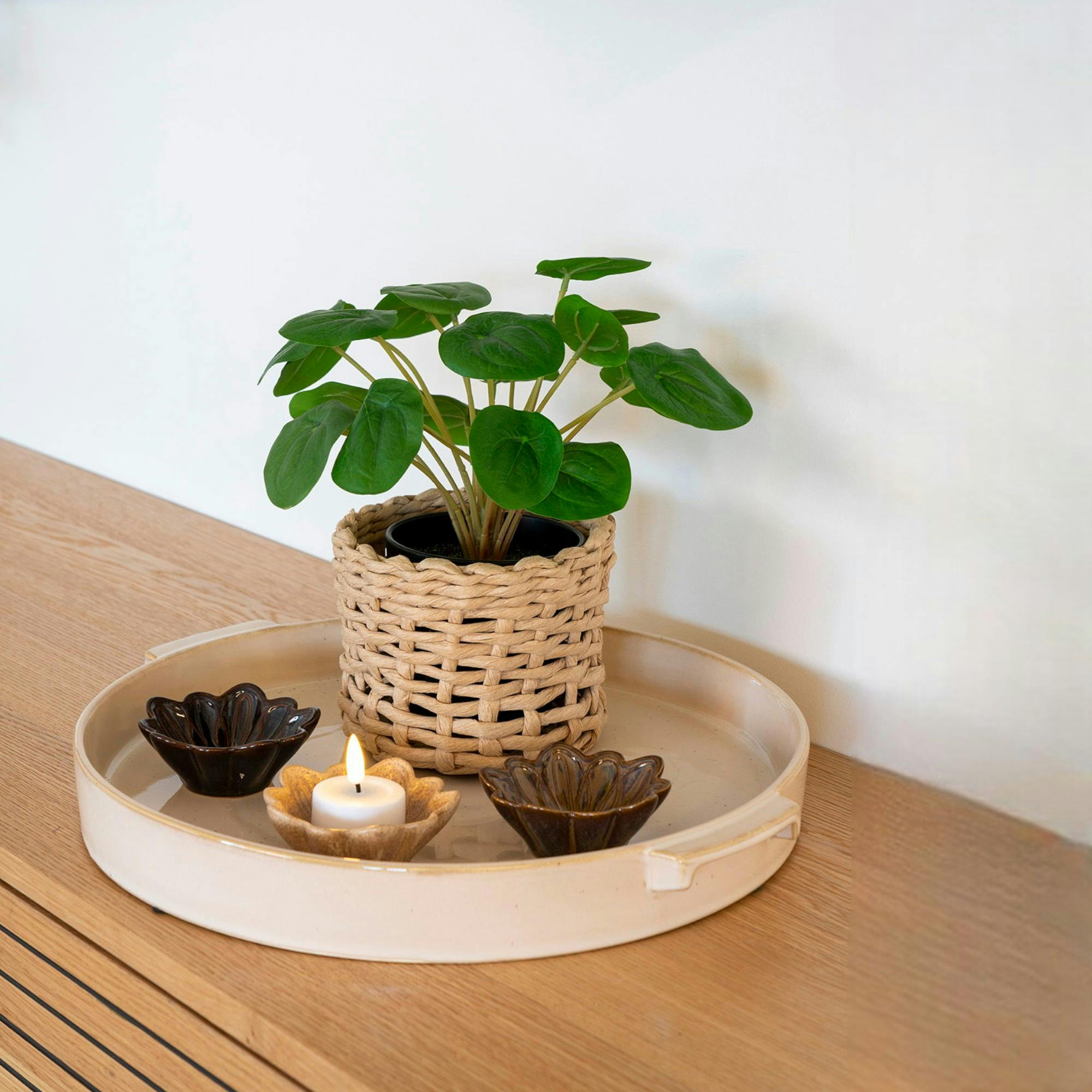 Plateau rond en céramique avec anses