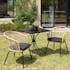 Salon de jardin 1 table carrée métal noir 70x70 cm - 2 fauteuils rotin synthétique ajouré couleur naturelle coussin noir GIJON