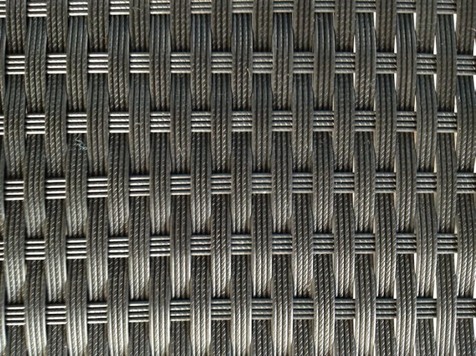 Salon de Jardin en résine tressée noire + coussin tissu gris COPACABANA