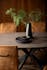Table de repas style moderne verre et metal pied mikado
