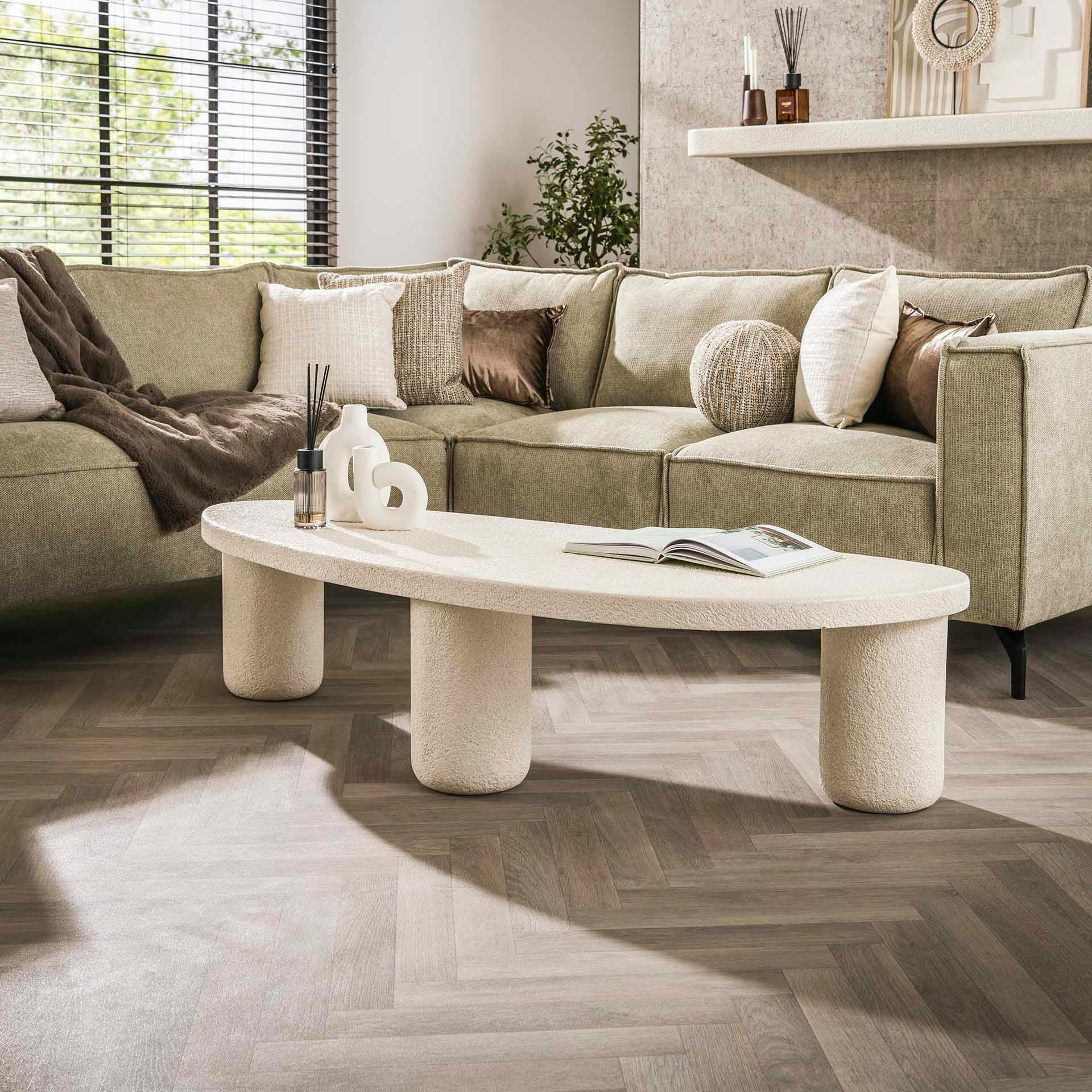 Table basse blanche en marbre composite forme galet TAJ