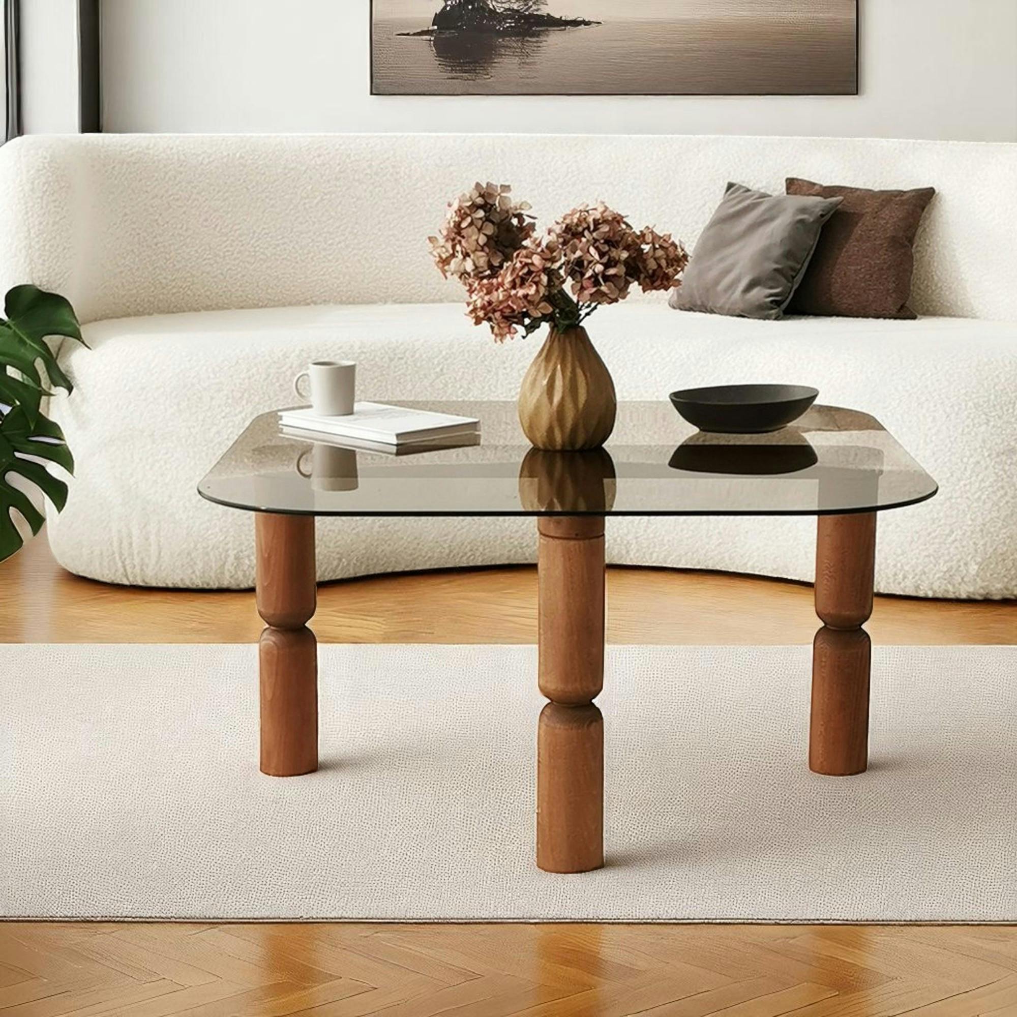 Table basse carrée en verre fumé - pieds bois marron sculpté BOMA