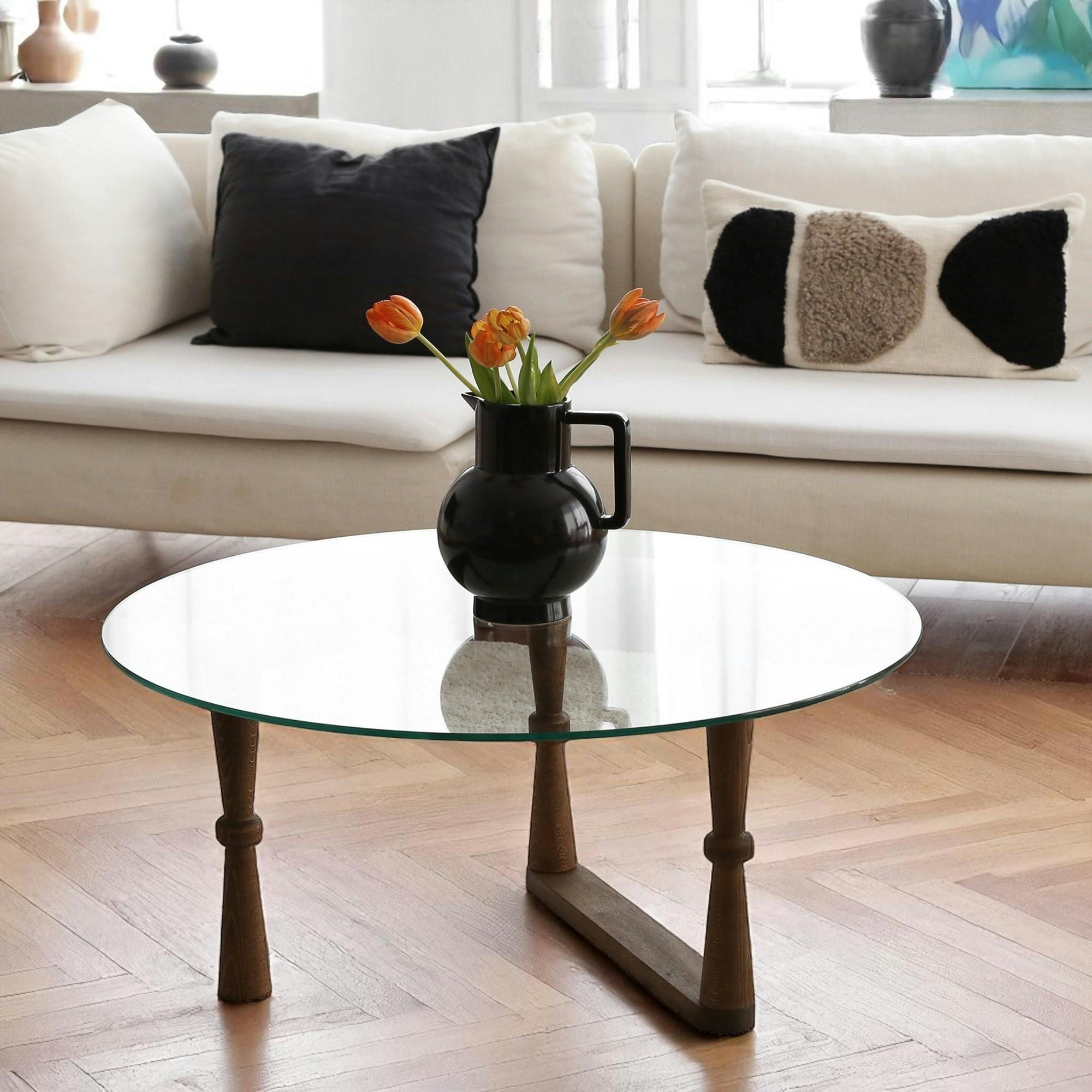 Table basse en verre ronde - pied bois sculpté BOMA