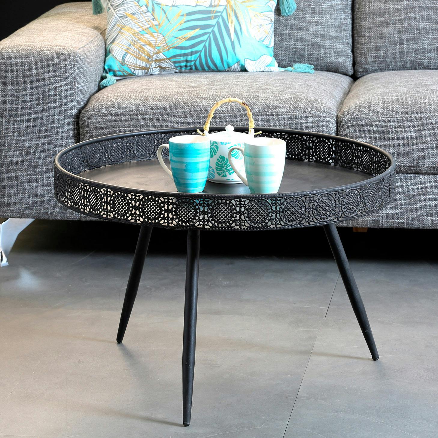 Table basse ronde en metal noir de style oriental