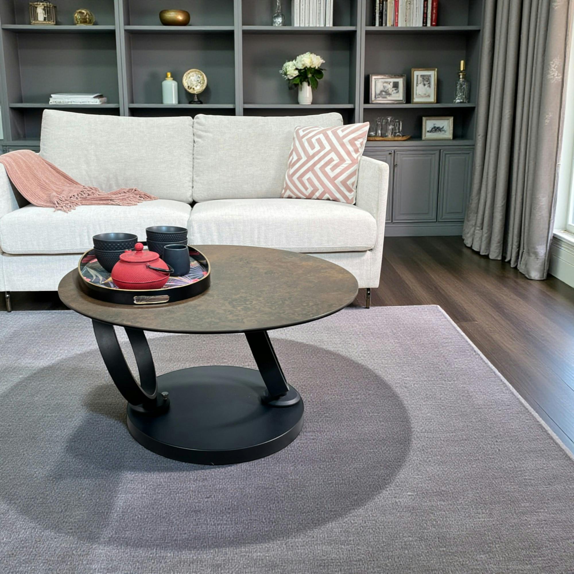 Table basse pivotante en céramique bronze LOMBARDIE