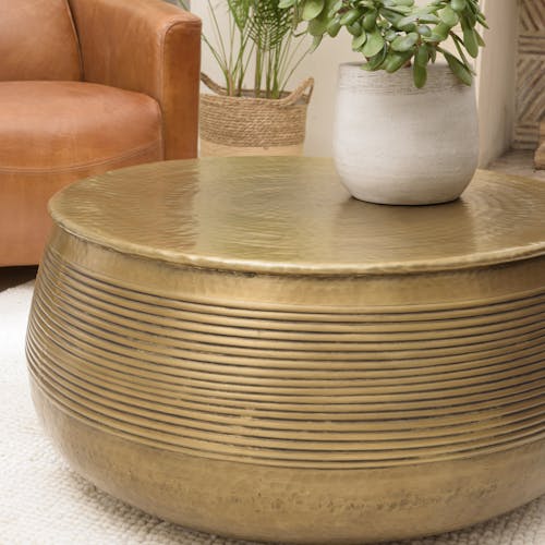 Table basse ronde alu doré strié style antique NADOR