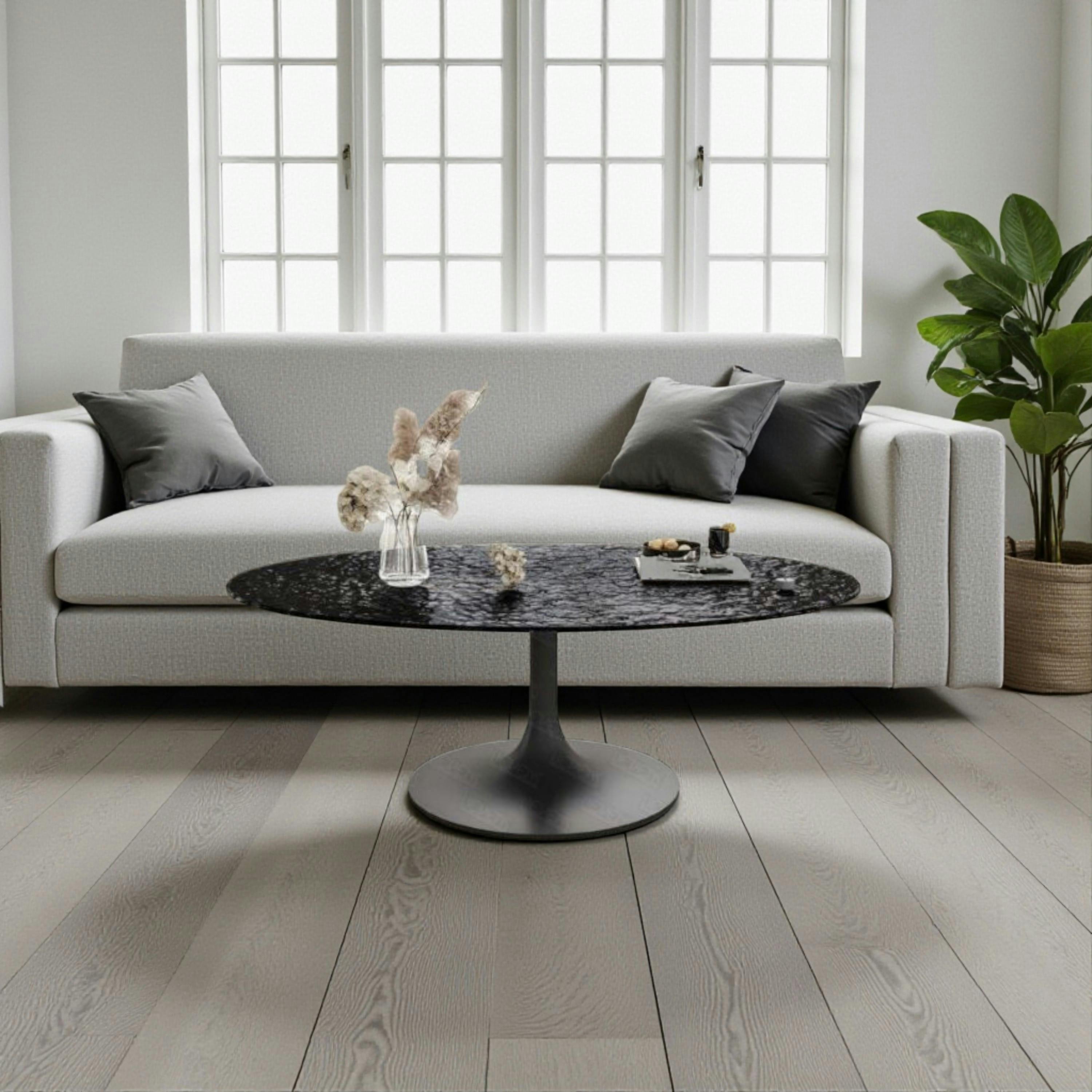 Table basse verre ondulé noir ovale, pied tulipe LIGURIE